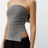 Top bandeau cu fir metalic cu orificii laterale