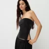 Top bandeau cu fir metalic cu orificii laterale