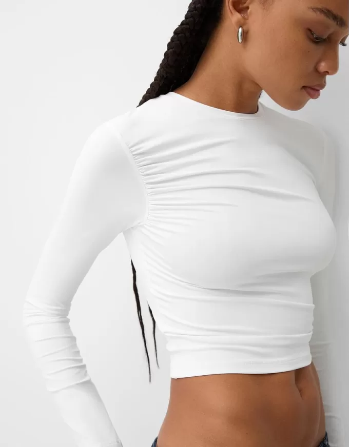 Tricou din poliamidă cu mânecă lungă adunată Tricou din poliamidă cu mânecă lungă adunată