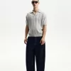Tricou polo cu mânecă scurtă texturată Tricou polo cu mânecă scurtă texturată