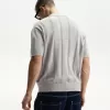 Tricou polo cu mânecă scurtă texturată Tricou polo cu mânecă scurtă texturată