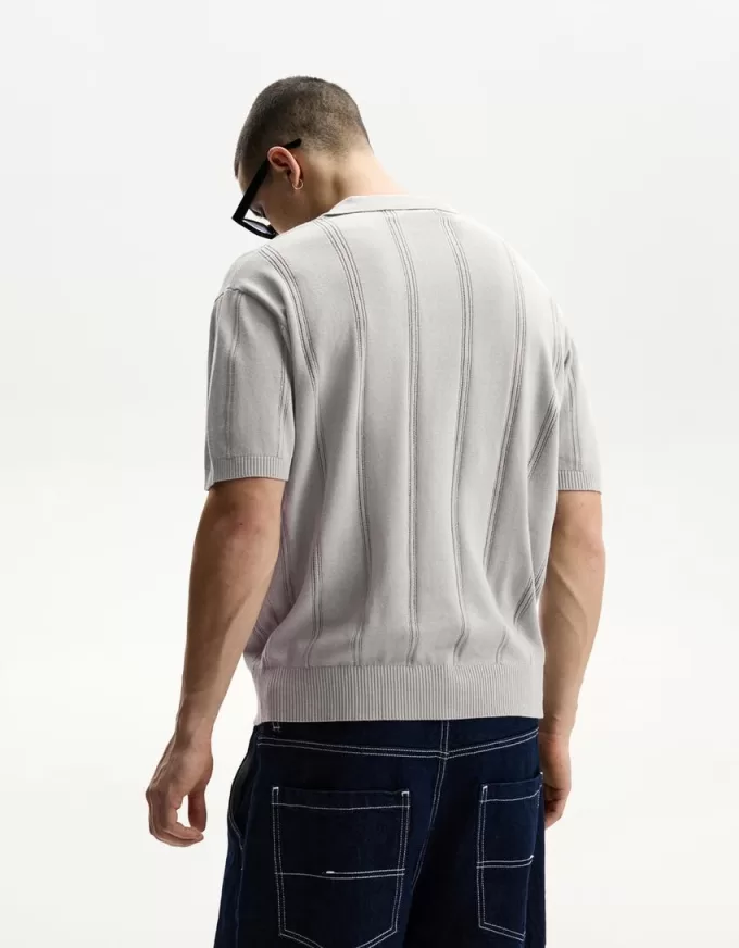 Tricou polo cu mânecă scurtă texturată Tricou polo cu mânecă scurtă texturată