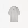 Tricou polo cu mânecă scurtă texturată Tricou polo cu mânecă scurtă texturată