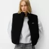 Vestă reversibilă din faux shearling