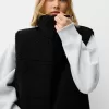 Vestă reversibilă din faux shearling