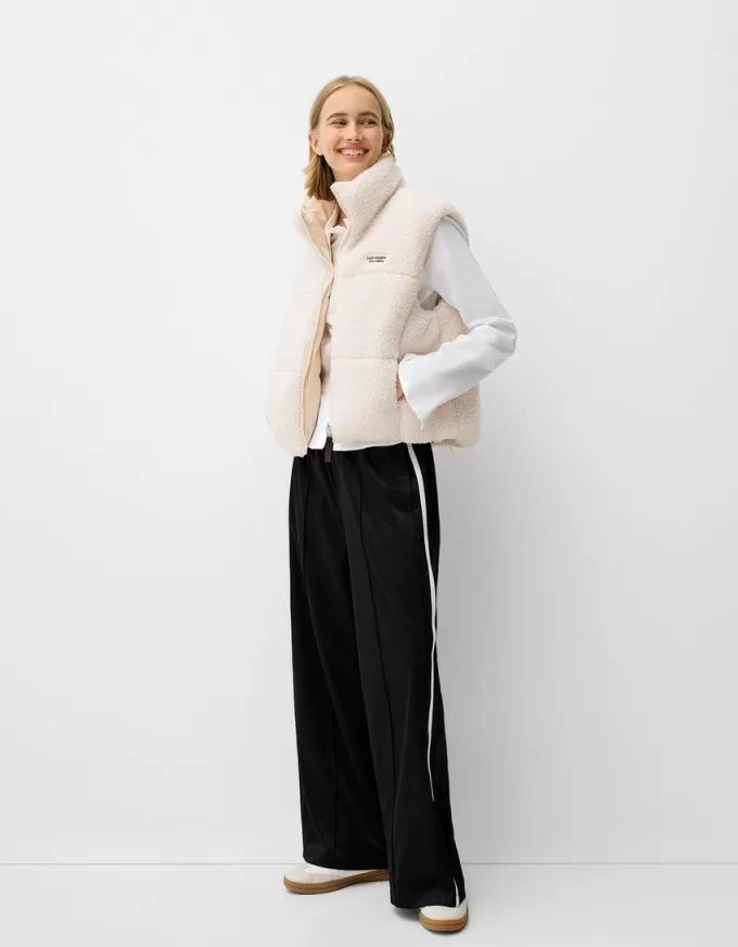 Vestă reversibilă din faux shearling Vestă reversibilă din faux shearling